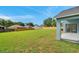 Expansive backyard offers a private retreat, surrounded by a tall wooden fence at 243 Chardonnay Pl, Valrico, FL 33594