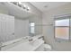 Bathroom boasts a large mirror, good lighting, and clean fixtures at 243 Chardonnay Pl, Valrico, FL 33594