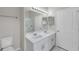 Bathroom with double sinks, a framed mirror, and tile flooring at 243 Chardonnay Pl, Valrico, FL 33594