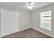 Bedroom has a large closet, ceiling fan, and neutral paint at 243 Chardonnay Pl, Valrico, FL 33594