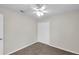 Bright bedroom features a ceiling fan, neutral paint, and closet at 243 Chardonnay Pl, Valrico, FL 33594