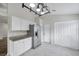 Bright eat-in kitchen with tile floors and stainless steel appliances at 243 Chardonnay Pl, Valrico, FL 33594