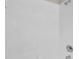 All-white tiled shower featuring modern fixtures at 243 Chardonnay Pl, Valrico, FL 33594