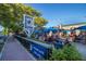 Outdoor seating at Dunedin Brewery with shaded tables and 