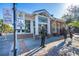 A street-level view of the Dunedin History Museum with sidewalk and landscaping at 245 Grove Cir N, Dunedin, FL 34698