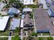 Aerial view of a home with a landscaped yard and charming exterior, nestled among neighboring houses at 2504 W North A St # A, Tampa, FL 33609