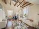Spacious attic features wood beams, seating, and a window bench at 2504 W North A St # A, Tampa, FL 33609