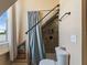 Attic bathroom with shower behind curtain, and built in nook at 2504 W North A St # A, Tampa, FL 33609