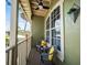 Charming balcony featuring outdoor seating and scenic views of the surrounding neighborhood at 2504 W North A St # A, Tampa, FL 33609