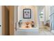 Bathroom nook displaying artistic touches and a window providing natural light at 2504 W North A St # A, Tampa, FL 33609