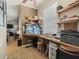Bedroom featuring a built-in desk, custom shelving, and bright natural light at 2504 W North A St # A, Tampa, FL 33609