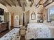 Spacious bedroom with exposed beams and a reading nook in the attic at 2504 W North A St # A, Tampa, FL 33609
