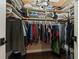 Walk-in closet with custom shelving and hanging rods provides ample storage space at 2504 W North A St # A, Tampa, FL 33609