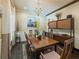 A dining room with wood floors and a table with seating for eight at 2504 W North A St # A, Tampa, FL 33609