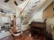 Entryway with a staircase, a piano, and hardwood flooring at 2504 W North A St # A, Tampa, FL 33609