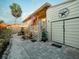 Home exterior with decorative details, covered front porch, and a paved walkway leading to the entrance at 2504 W North A St # A, Tampa, FL 33609