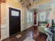 Foyer features dark wood floors, complemented by detailed trim work and a stained glass front door at 2504 W North A St # A, Tampa, FL 33609