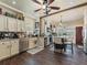 Spacious kitchen with stainless steel appliances, an island with bar seating, and dark wood flooring at 2504 W North A St # A, Tampa, FL 33609