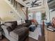Cozy living room with decorative ceilings, hardwood floors, large sofa, and plenty of natural light at 2504 W North A St # A, Tampa, FL 33609