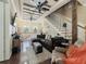 Bright living room featuring decorative ceilings, wood floors, and a staircase leading to the second floor at 2504 W North A St # A, Tampa, FL 33609