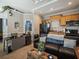 Inviting living space featuring a comfortable leather sofa and convenient kitchenette at 2504 W North A St # A, Tampa, FL 33609