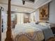 Large main bedroom featuring a unique wall hanging and en suite bathroom access at 2504 W North A St # A, Tampa, FL 33609