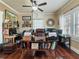 Home office with beautiful wood floors, ample desk space, and lots of natural light from the windows at 2504 W North A St # A, Tampa, FL 33609