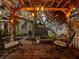 Relaxing outdoor pergola featuring cozy seating and warm string lights for evening enjoyment at 2504 W North A St # A, Tampa, FL 33609