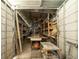 Well-organized storage shed with ample shelving and workbench, ideal for hobbyists and craftsmen at 2504 W North A St # A, Tampa, FL 33609