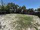 Large, fenced backyard offers plenty of space for outdoor activities at 2907 W Elrod Ave, Tampa, FL 33611