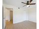 Bedroom featuring a ceiling fan, closet, and bright walls at 302 Lake Parsons Grn # 104, Brandon, FL 33511