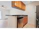 Efficient kitchen space featuring modern appliances and ample cabinetry, ideal for cooking and entertaining at 302 Lake Parsons Grn # 104, Brandon, FL 33511