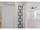 Hallway featuring laundry closet, coat closet, and bedroom at 302 Lake Parsons Grn # 104, Brandon, FL 33511