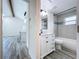 Beautiful bathroom featuring a shower and tub combination with a modern vanity at 309 Congress St, Oldsmar, FL 34677