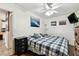 Bedroom featuring neutral walls, wood floors, and a ceiling fan at 34215 Kiefer Rd, Dade City, FL 33525