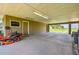 Large covered carport area with ample storage and easy access to the property at 34215 Kiefer Rd, Dade City, FL 33525