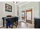 View of the dining area showcasing wood-look floors and an outdoor view at 34215 Kiefer Rd, Dade City, FL 33525