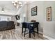 Cozy dining area adjacent to the living room, with seating for four at 34215 Kiefer Rd, Dade City, FL 33525