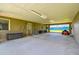 Open patio area with exterior lighting and a view of the backyard at 34215 Kiefer Rd, Dade City, FL 33525