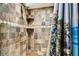 Detailed tile shower with built-in shelves and shower curtain at 34215 Kiefer Rd, Dade City, FL 33525
