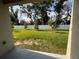 Spacious backyard featuring green grass and white vinyl fence at 36233 Joseph Blake St, Zephyrhills, FL 33541