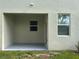 Covered patio with concrete flooring and view of backyard at 36233 Joseph Blake St, Zephyrhills, FL 33541