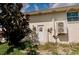 Exterior view of the back of the house with utilities at 4434 Dewey Dr, New Port Richey, FL 34652