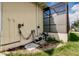 Utilities outside with enclosed lanai at 4434 Dewey Dr, New Port Richey, FL 34652