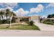 Charming single-story home with a two-car garage, well-manicured lawn, and tasteful landscaping at 4434 Dewey Dr, New Port Richey, FL 34652