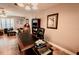 Home office space featuring a large desk area and views into the Gathering room space beyond at 4434 Dewey Dr, New Port Richey, FL 34652