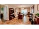Home office with tile flooring, built-in shelving, and an outdoor view at 4434 Dewey Dr, New Port Richey, FL 34652