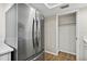 Modern kitchen showcasing a stainless steel refrigerator and a pantry for ample storage at 4510 Overlook Ne Dr # 224, St Petersburg, FL 33703