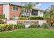 The Lake Overlook Condominiums boast lush landscaping and classic brick architecture near the entrance at 4510 Overlook Ne Dr # 224, St Petersburg, FL 33703