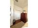 Bedroom with a laminate floor and an adjacent closet for storing belongings at 4745 Trout River Xing, Ellenton, FL 34222